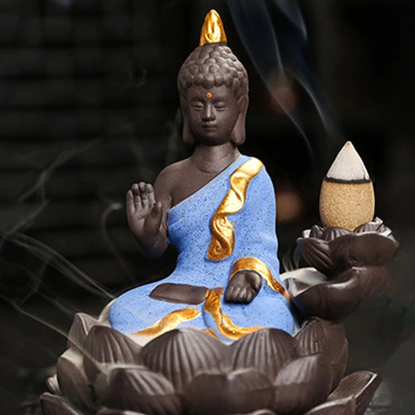 Golden Buddha backflow incense burner in pondering wise gesture pose with hand-glazed finish detail