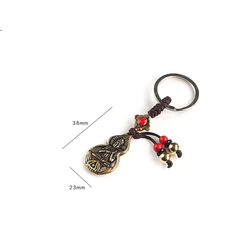Product size reference image showing Mahasthamaprapta Buddha gourd keychain dimensions of 38mm length and 23mm width with standard tassel and charm design measurement