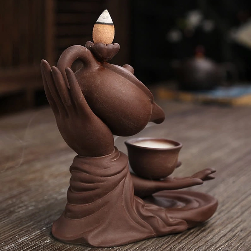 Complete product display of Buddha hand backflow incense burner showing peaceful meditation ambiance