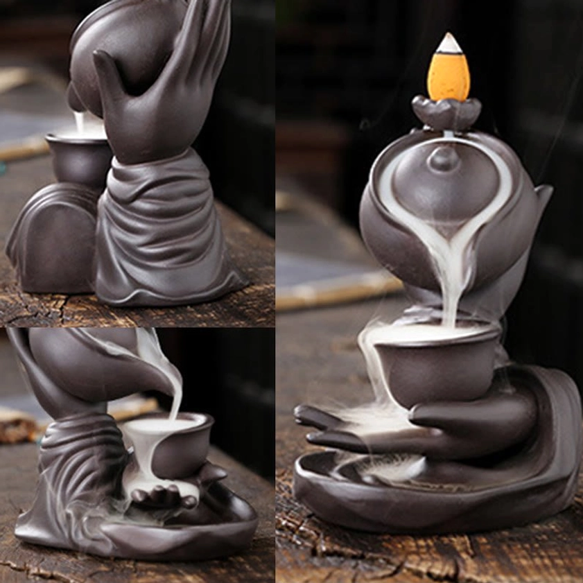 Combined perspective showing full backflow incense effect of Buddha hand teapot burner on wooden surface