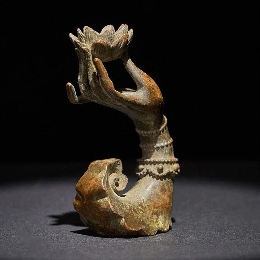 Bronze patinated Buddha's hand lotus sculpture showing right three-quarter perspective with ruyi base - meditation decor