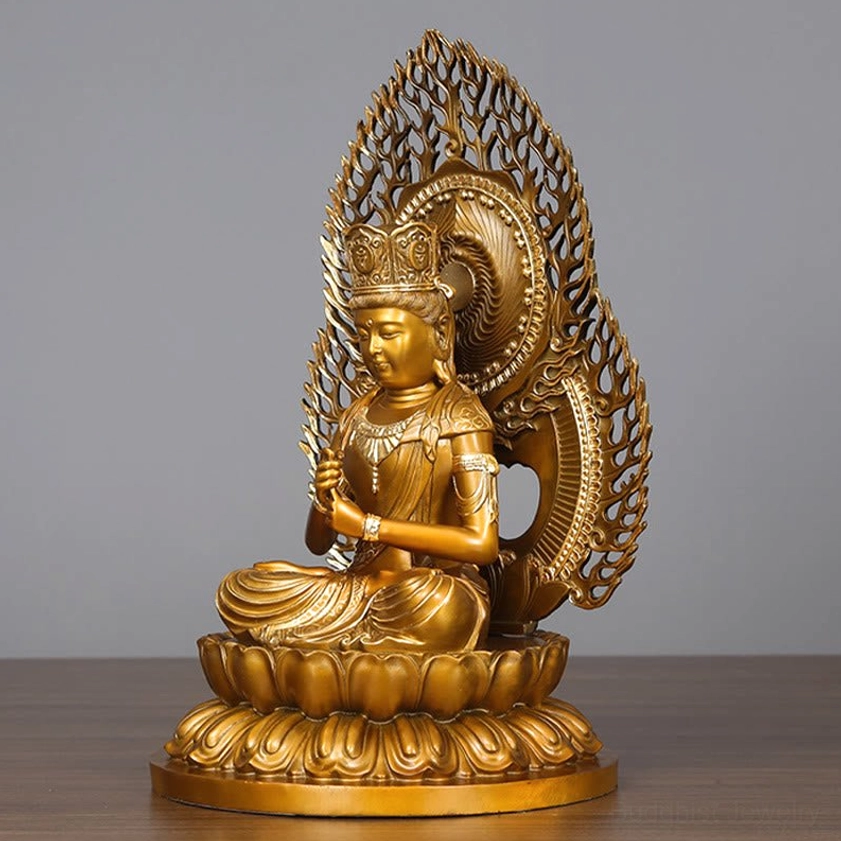 Handcrafted Buddha copper statue showing intricate carving details and natural patina finish of premium brass material