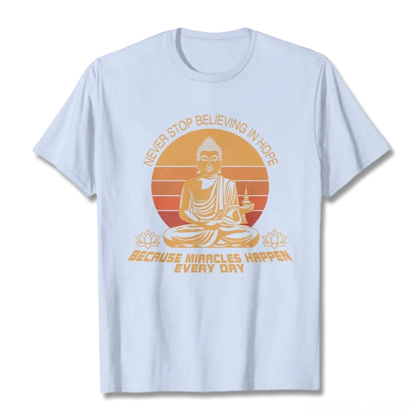 Buddha's Hope graphic cotton tee flat lay - light cyan base with vintage Buddha graphic and hope message