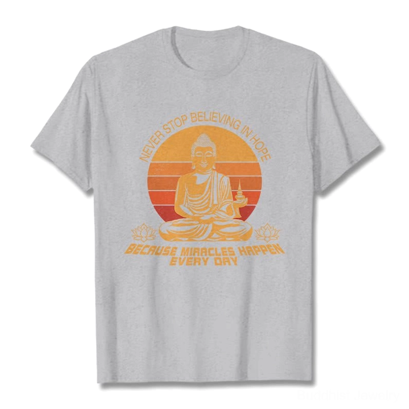 Buddha's Hope inspirational cotton t-shirt flat lay - light grey shirt with retro Buddha design and affirmation