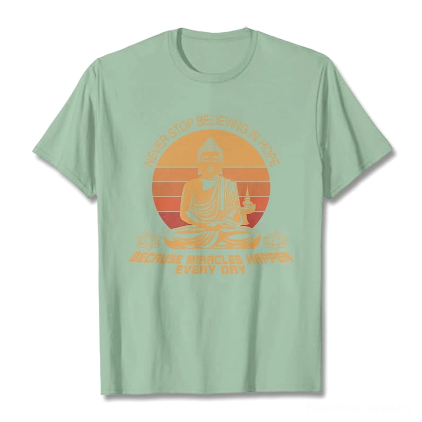Buddha's Hope graphic t-shirt flat lay - sage green cotton shirt with vintage Buddha print and affirmation