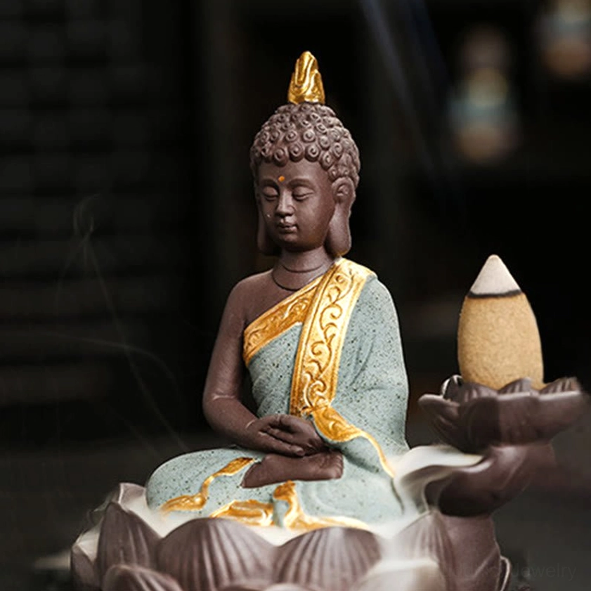 Buddha incense burner detailed view showing handcrafted ceramic artistry and paint application