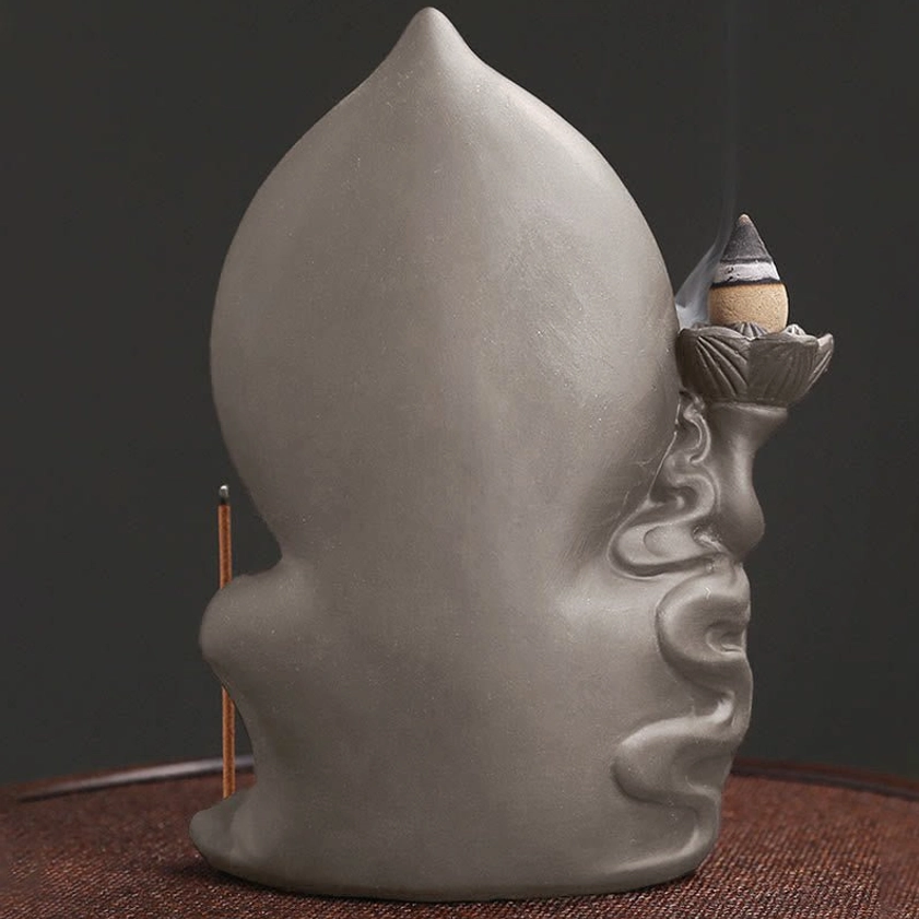 Buddha incense burner rear view showing leaf-shaped back cover and cloud pattern design
