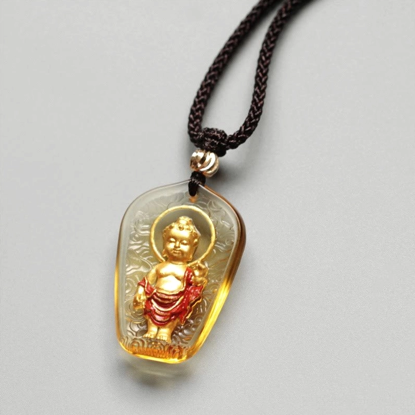 Mini Buddha Liuli crystal pendant necklace - delicate hand-painted glazed pendant with golden accents on light background