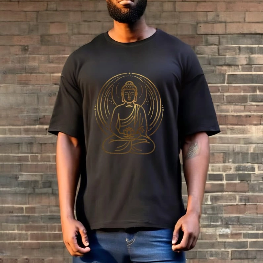 Male model in black buddha lotus golden halo T-shirt with denim on brick wall background