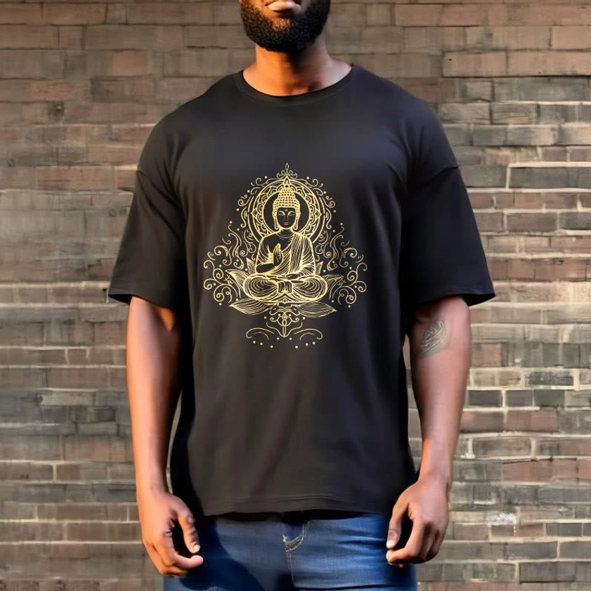 Male model wearing black Buddha lotus t-shirt with jeans brick wall background casual street style