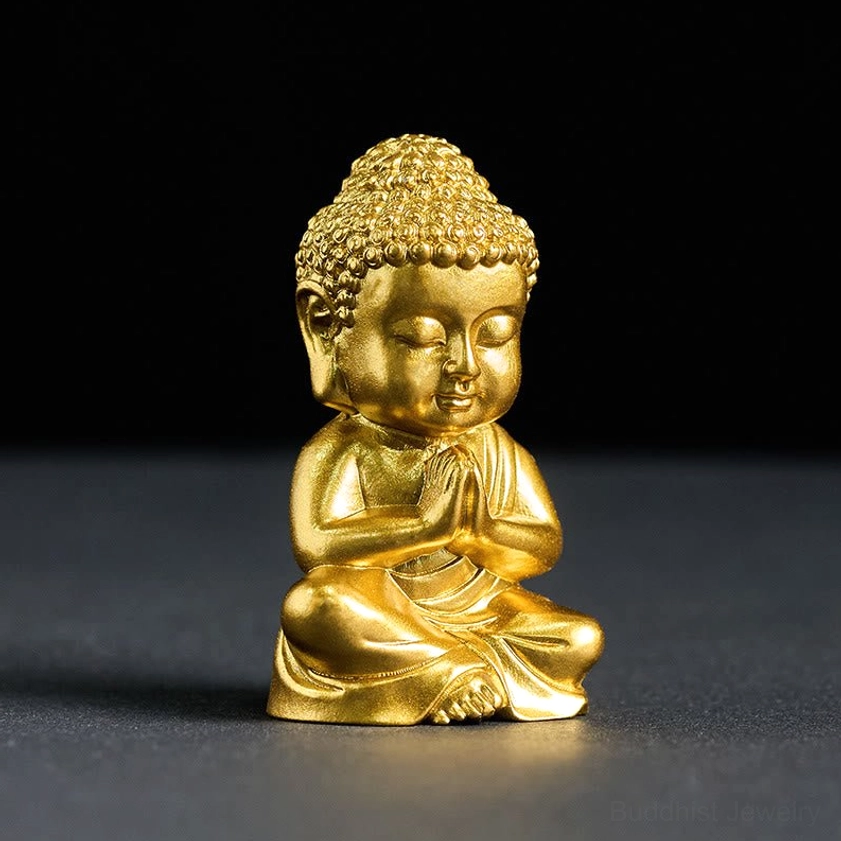 Golden Buddha meditation magnet detail shot showing fine craftsmanship and resin texture