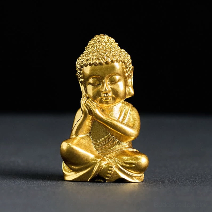 Buddha fridge magnet lifestyle scene placed on kitchen refrigerator holding family photos and notes