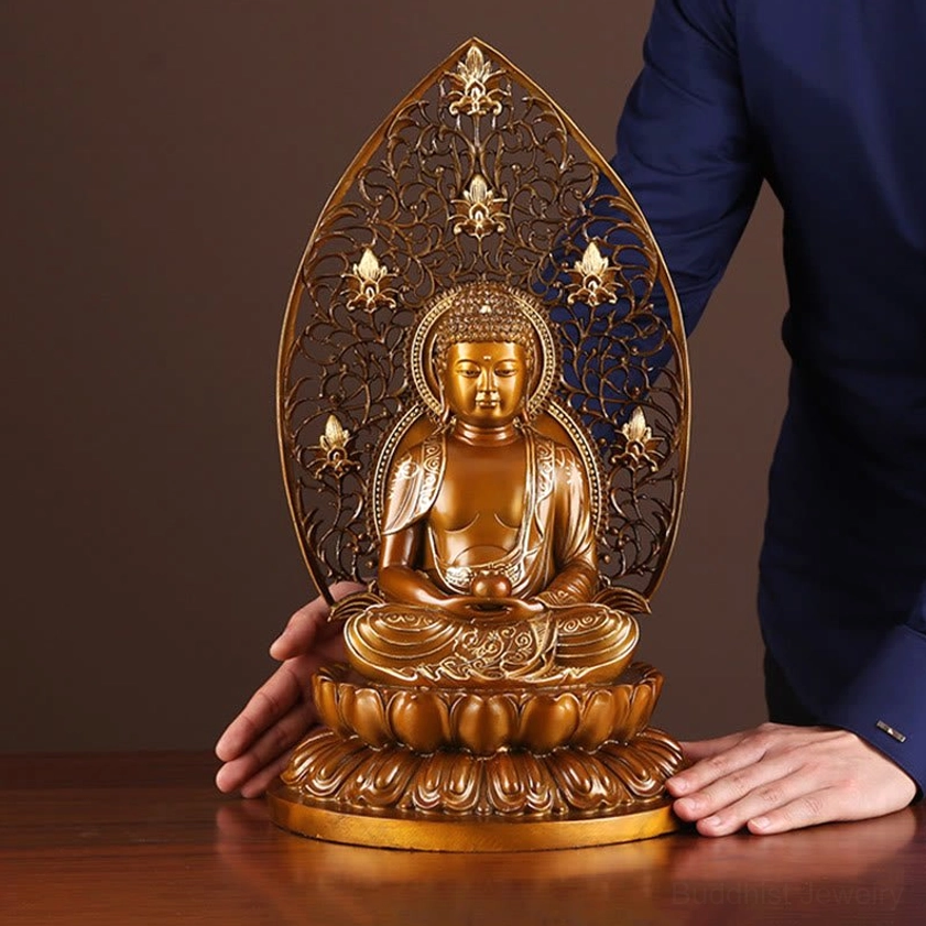 Buddha meditation statue side profile - Handcrafted copper figurine with intricate details and natural bronze patina