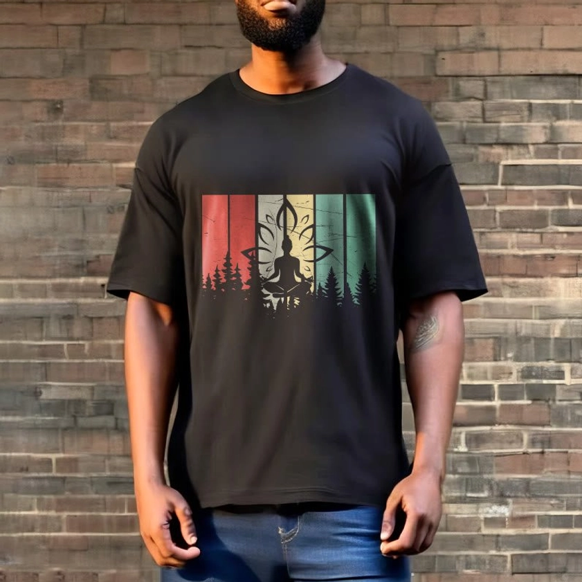 Man model showcasing black Buddha lotus meditation t-shirt against brick wall background relaxed fit