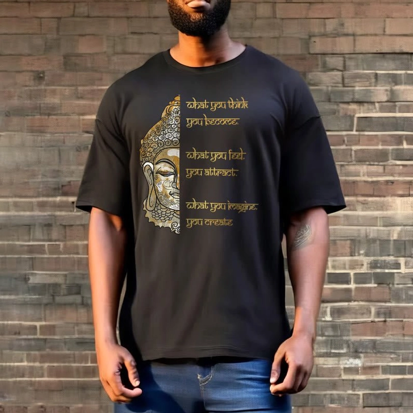 Man in black what you think Buddha mindfulness shirt full front body view with brick wall backdrop