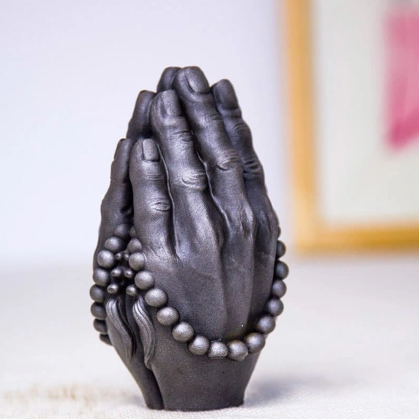 Artisanal Buddha Namaste hand iron powder resin statue showcasing handcrafted quality and authentic spiritual aesthetics