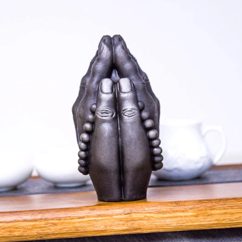Buddha Namaste hand ornament with aged patina and spiritual energy for Feng Shui placement and blessing home spaces