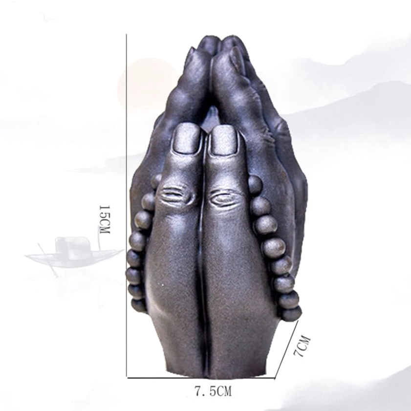 Buddhist Namaste hand statue with prayer beads and reverence gesture symbolizing mindfulness and inner peace for daily practice