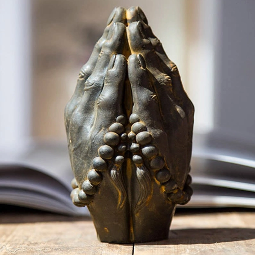 Buddha Namaste hand statue rear bottom view showing double prayer bead sets and carved finger textures with rust bronze finish