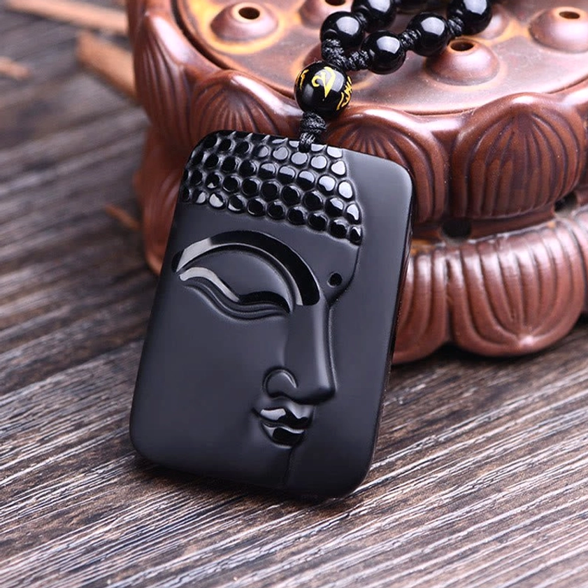 Buddha Pendant Necklace Black Obsidian - 3/4 angle view showing square pendant with embossed Buddha head design on beaded necklace