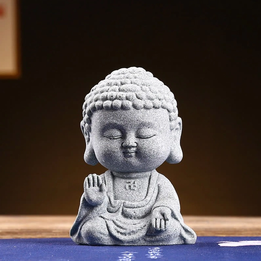 Buddha raises hand sacred posture statue representing blessing fearlessness and divine protection energy