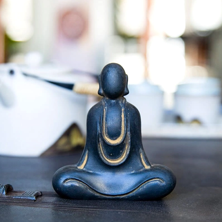 Buddha resin sculpture with iron powder composition showing durable lightweight construction