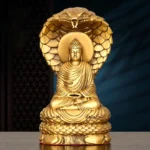 Buddha Shakyamuni cobra protection copper statue front view - handcrafted golden meditation figurine with cobra hood