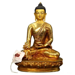 Handcrafted gilt bronze Buddha Shakyamuni statue with lotus pedestal, frontal view showing serene expression and golden finish