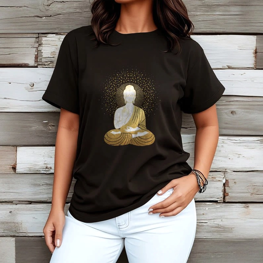 Woman wearing black cotton meditation Buddha golden aura t-shirt wooden background casual wear
