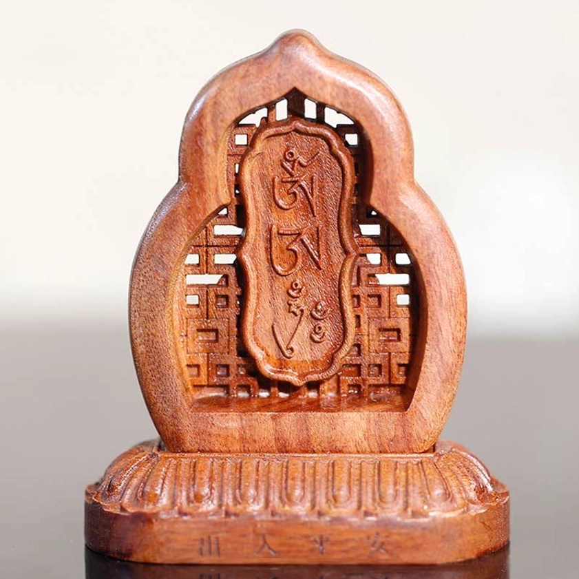 Padmasambhava Buddha statue back view with hollowed lattice frame and engraved sacred blessing text