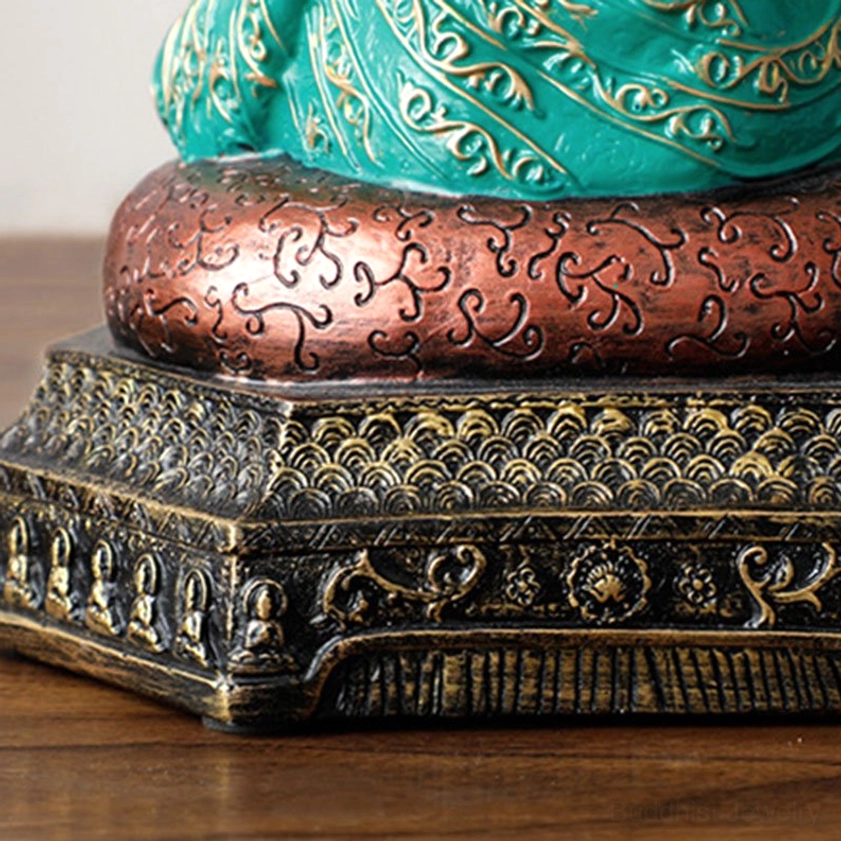 Bottom view of Buddhist statue base showing red carved cushion and embossed vintage pedestal design