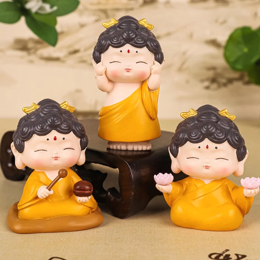 Detailed close-up of Buddha resin statue showing hand-painted facial features and serene expression