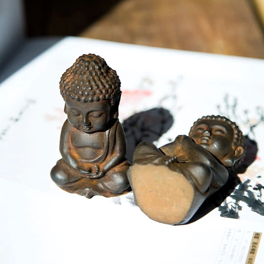 Multiple Buddha statues arrangements - different poses and finishes displayed together collection