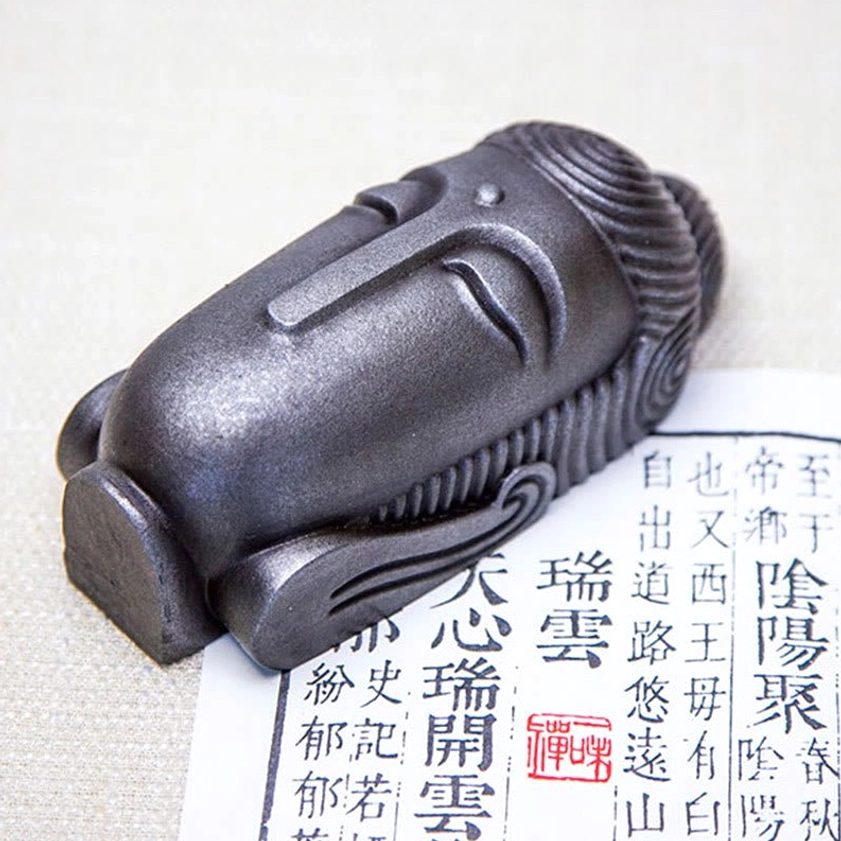 Handcrafted Buddha meditation statue showing eco-friendly iron powder resin material