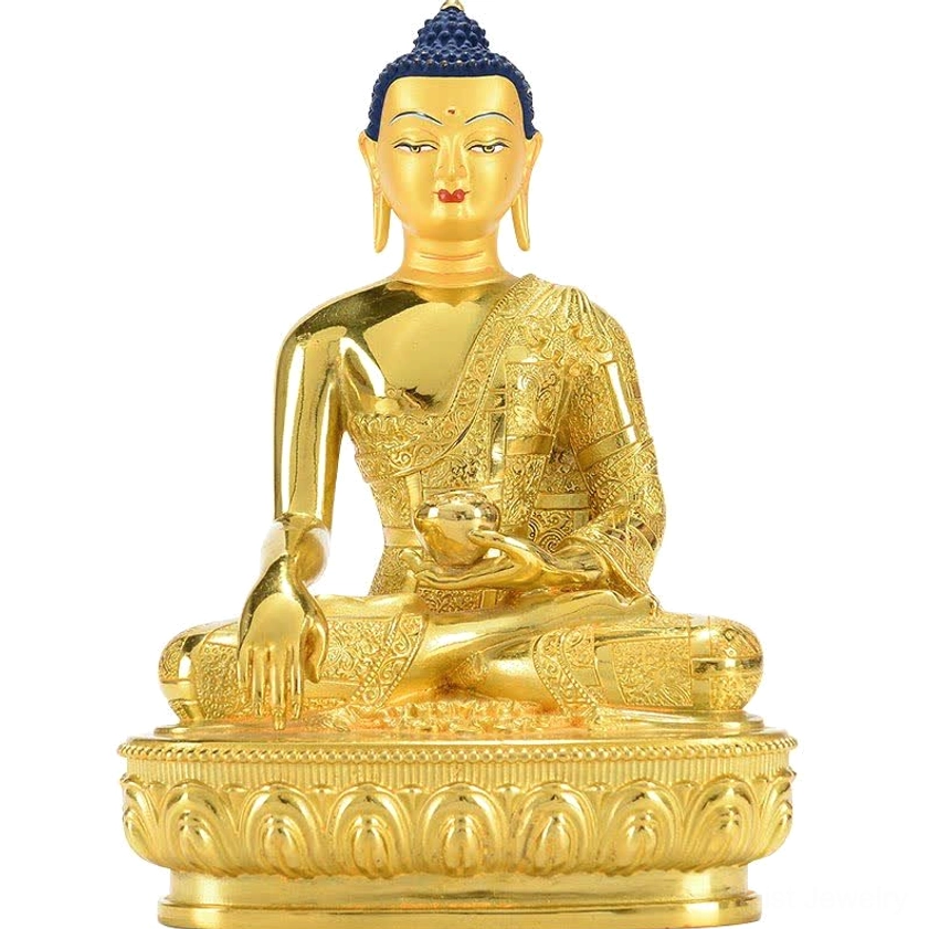 Buddha statue close-up frontal view showing detailed facial features and gilt golden finish