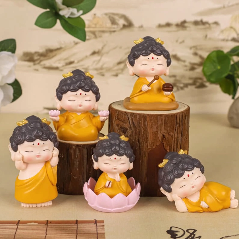 Buddha resin statue with intricate hand-painted golden accents and detailed craftsmanship