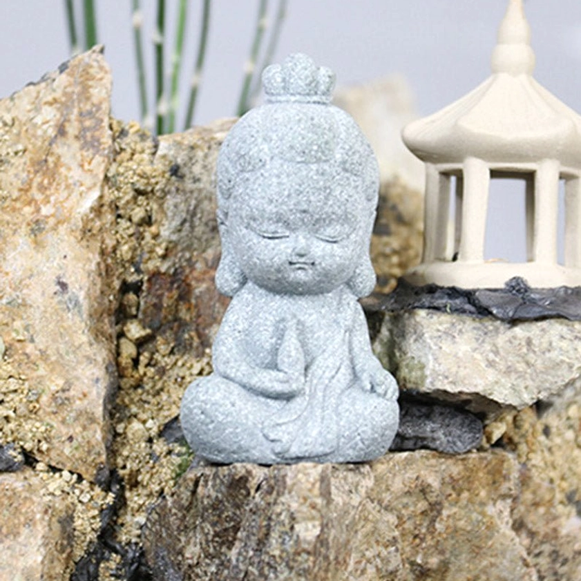 Light-colored mini Buddha figurine in zen landscape setting with miniature pavilion, off-white sandstone for peaceful home display
