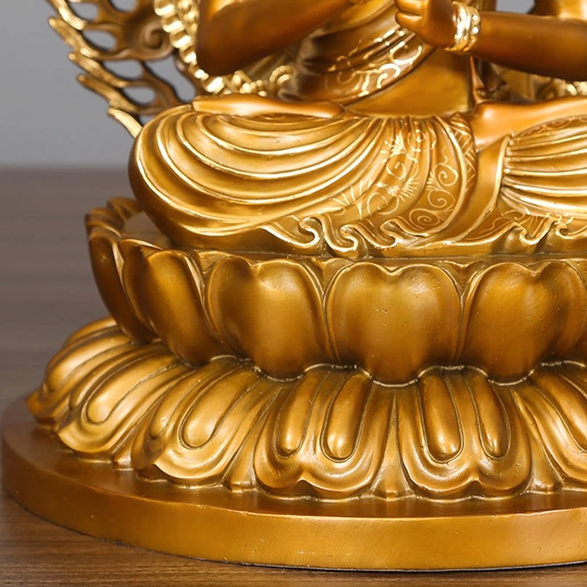 Lower body and base detail of Tathagata Buddha statue showing thick carved lotus petals and solid round foundation
