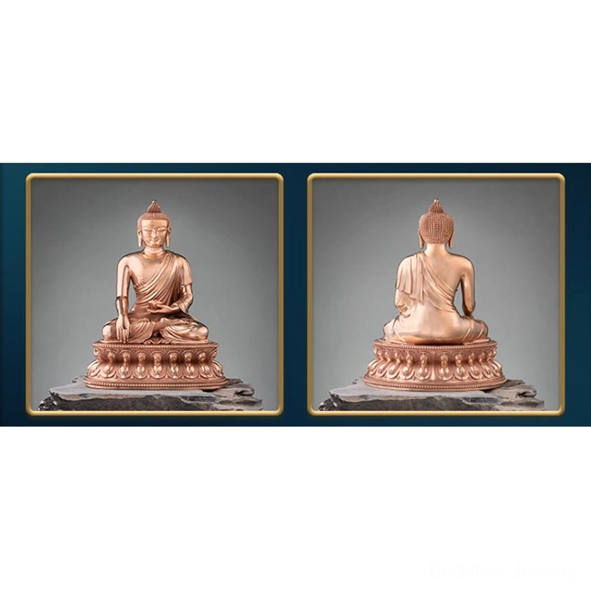 Buddha statue close-up showing intricate lotus throne carvings and metallic finish