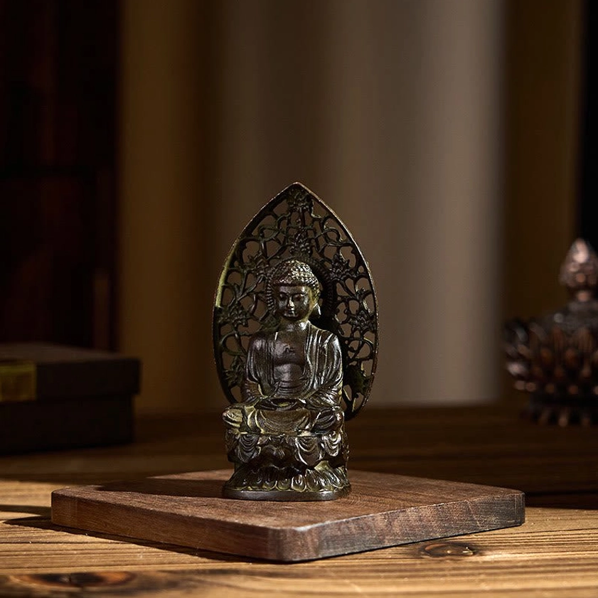 Buddha statue low angle front view seated meditation pose with antique bronze patina finish