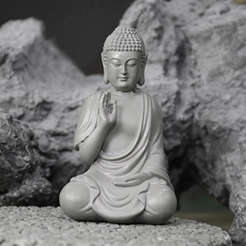 Buddha statue in meditation environment showing practical placement for mindfulness practice and spiritual altar setup