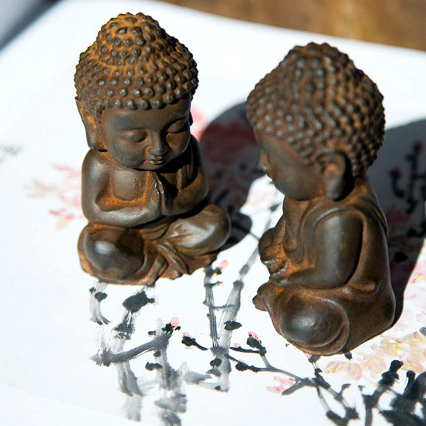 Handcrafted Buddha meditation figurine close-up detail - iron powder resin blend artisan craftsmanship