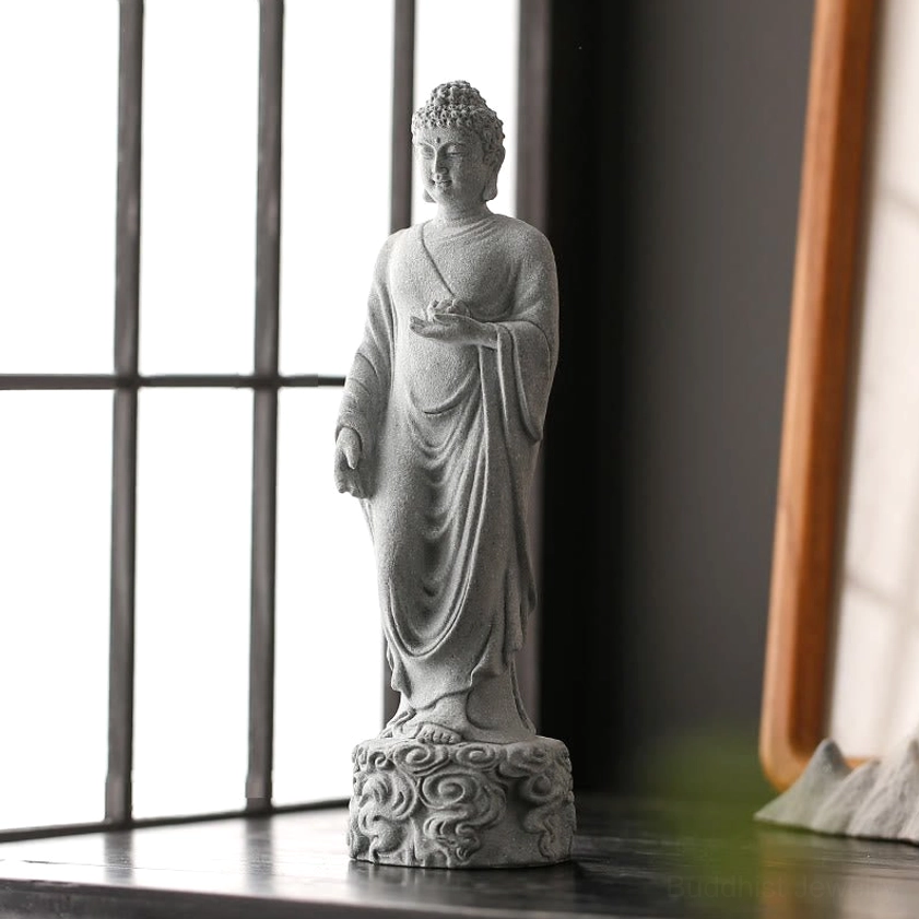 Buddha statue with auspicious clouds carving in natural daylight window display