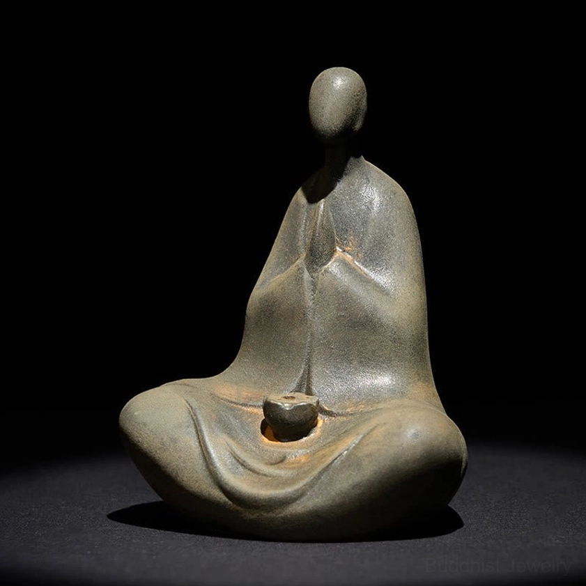 Buddha statue left three-quarter angle showing prayer hands detail and incense tray, iron powder resin craft