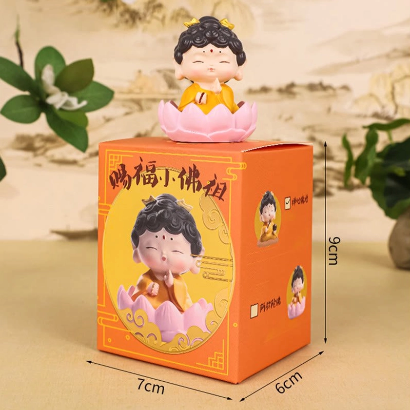 Miniature Buddha resin statue with packaging box showing product dimensions and spiritual home decor
