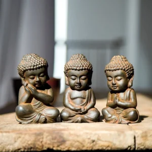 Rust patina Buddha statue set - three meditation figurines with weathered brown finish, handcrafted iron resin