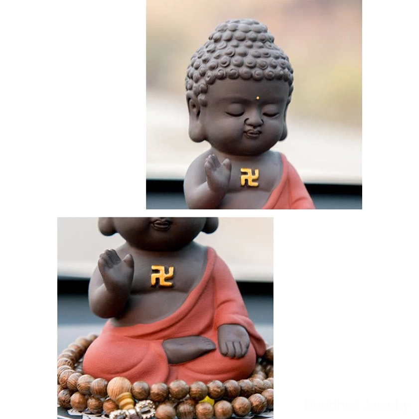 Purple clay Buddha statue with serene facial expression, matte finish representing authentic Buddhist spiritual symbolism and inner peace
