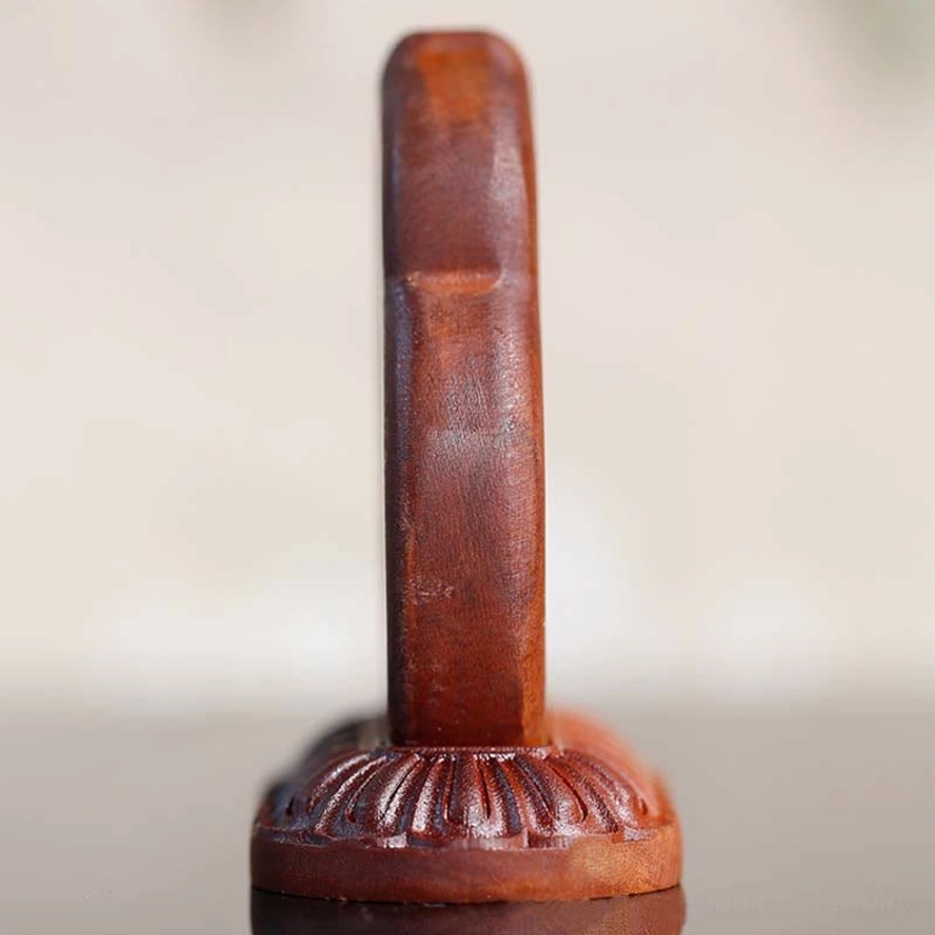 Side profile view of Vajrasattva Buddha wood statue showing lotus base and solid wooden frame construction