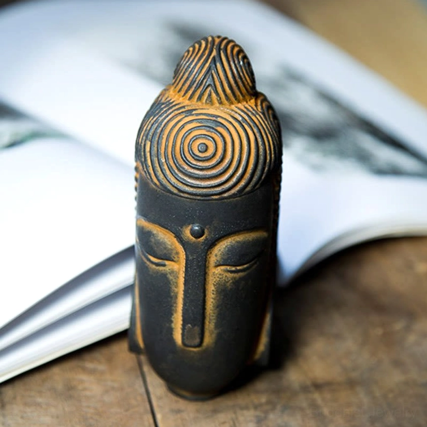 Buddhist symbol guide card with golden Buddha illustration and English description of spiritual significance