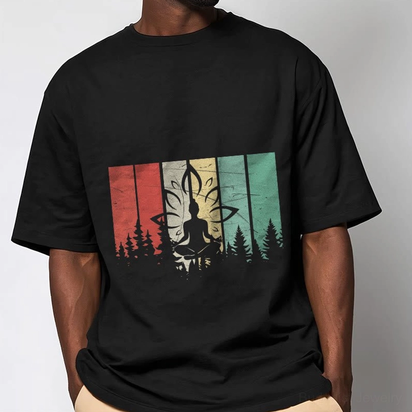 Male model wearing black Buddhist graphic t-shirt with lotus meditation design and colorful stripe print